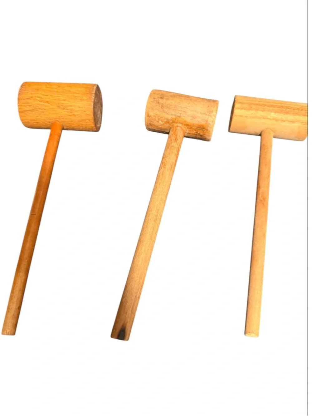 traditional wooden mallets, commonly used for tasks like cracking shellfish,